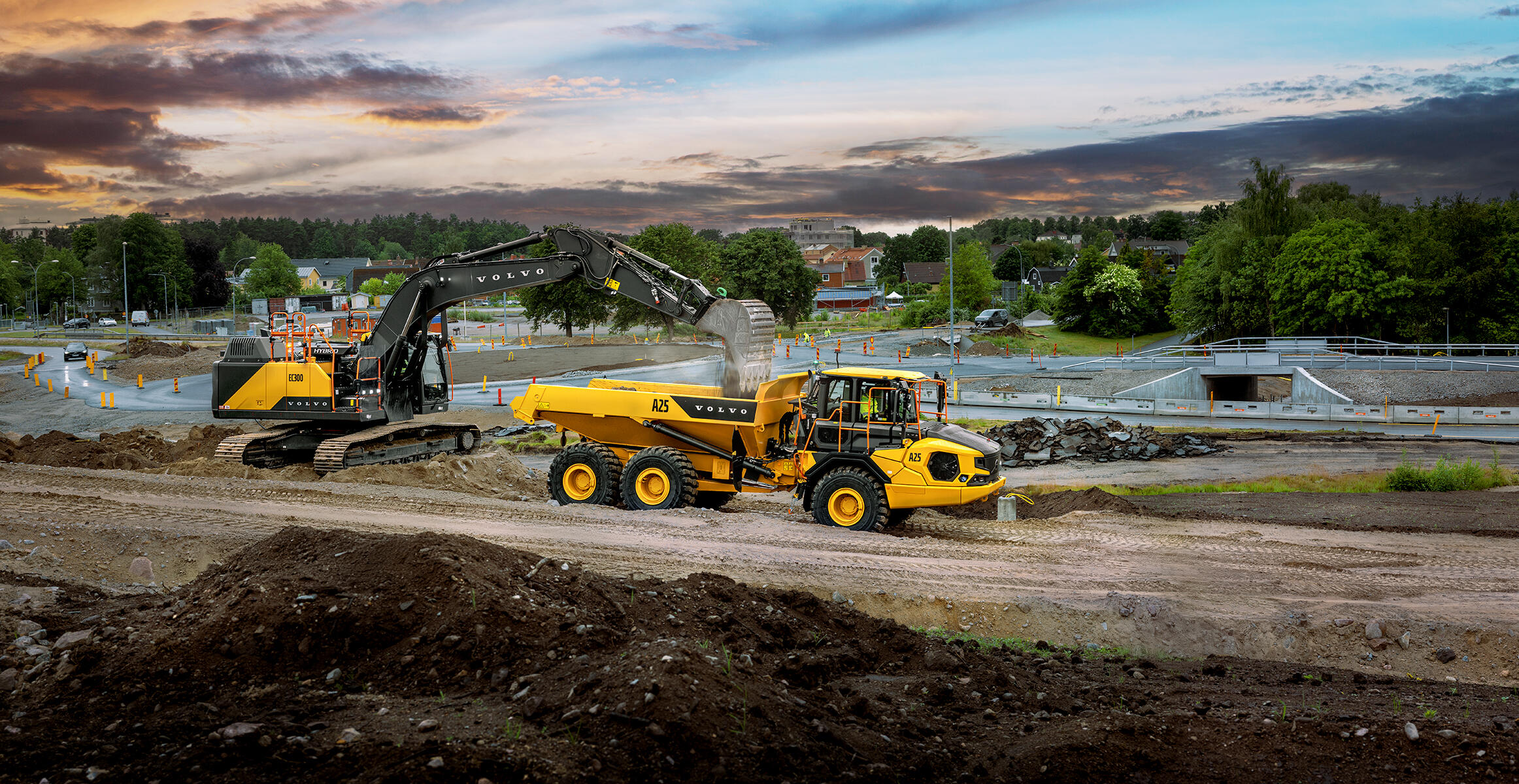 Volvo A25 articulated hauler working in road construction, transporting material with high productivity and stability