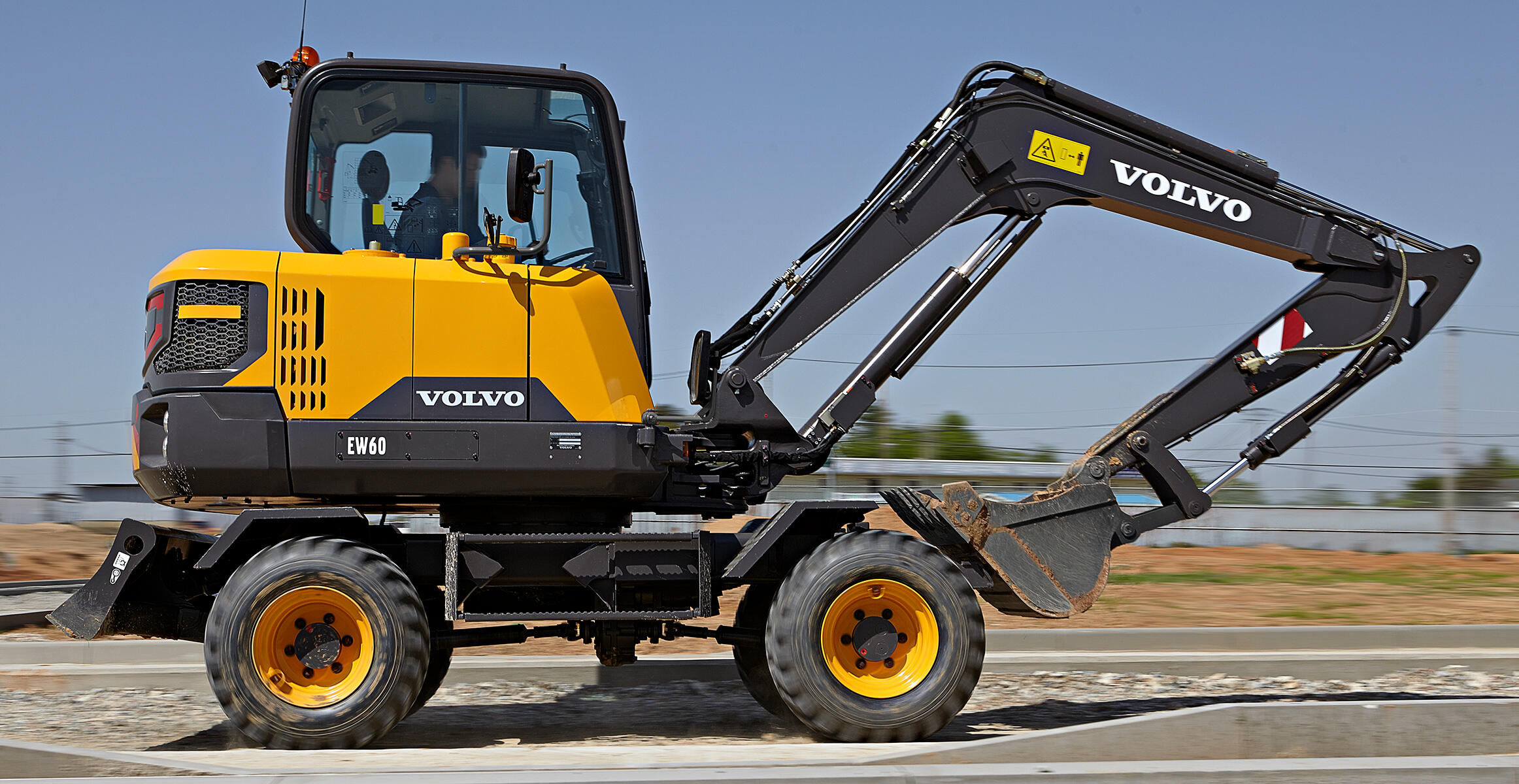 volvo-feature-compact-excavator-ew60-cn4-wheeled-performance-boosted-performance-2324x1200