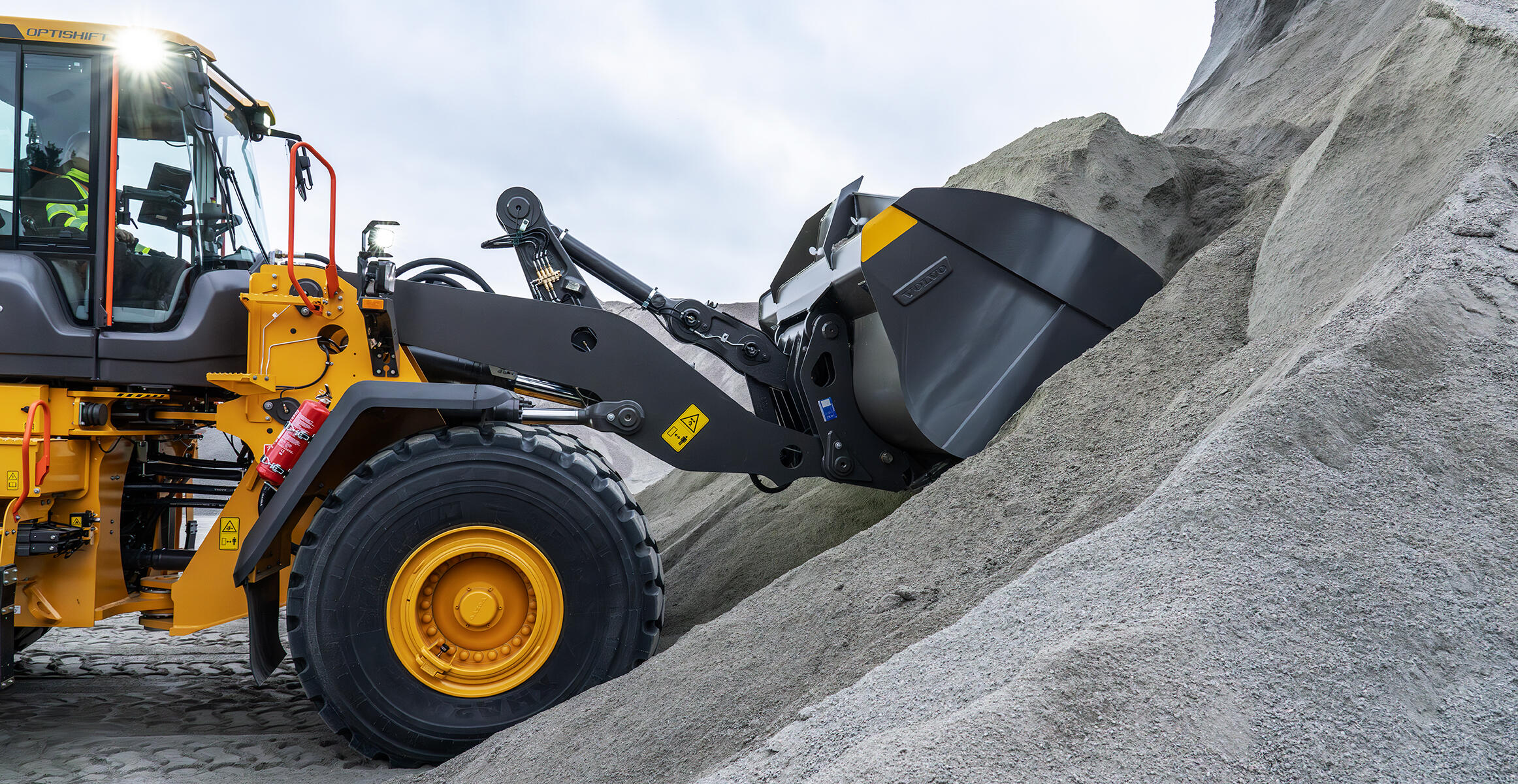 Volvo L150 wheel loader loading from a pile of gravel