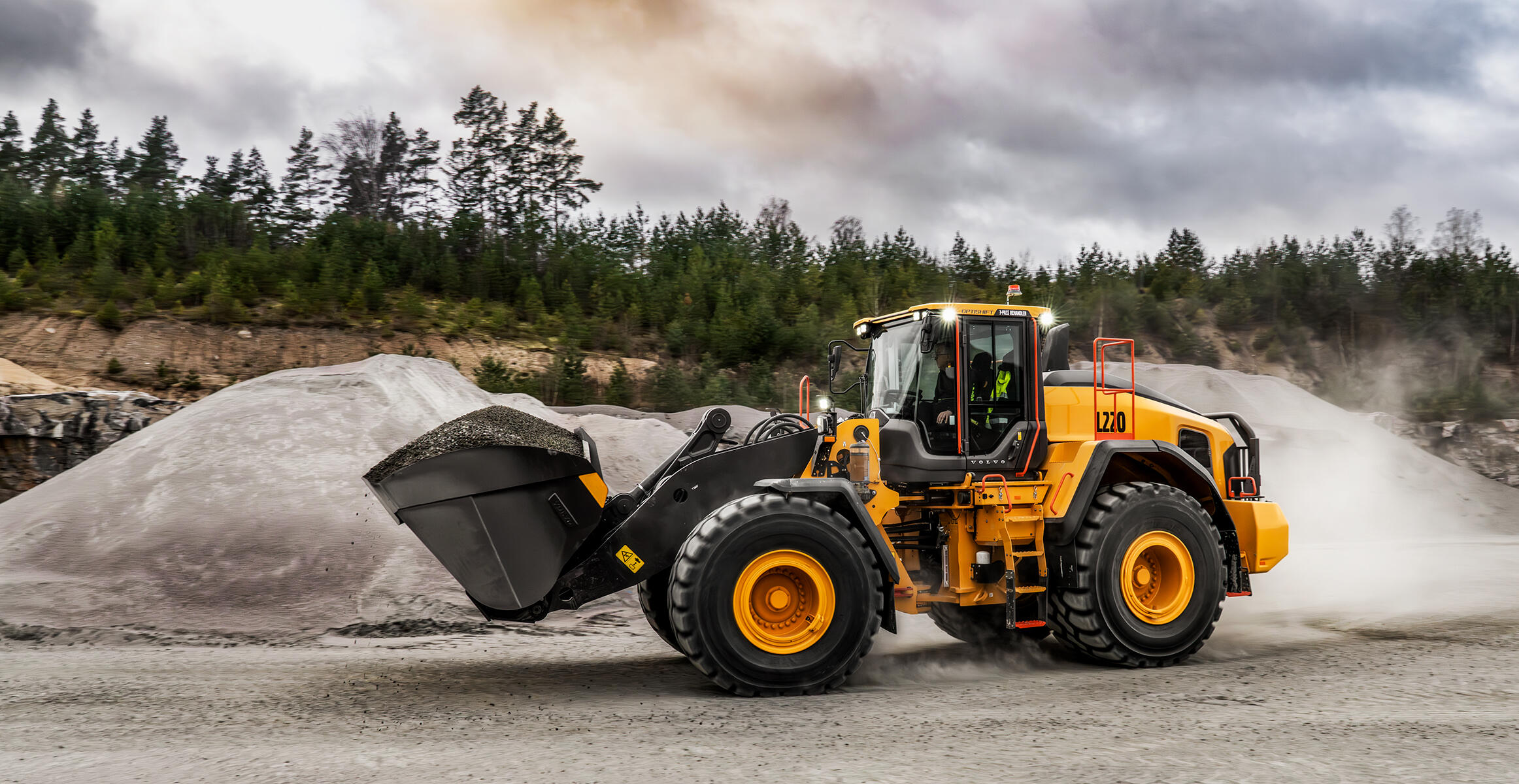 Volvo L220 wheel loader travelling through construction site